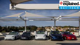 Tesla vehicles charge at the One Paseo mall in San Diego (New York Times)
