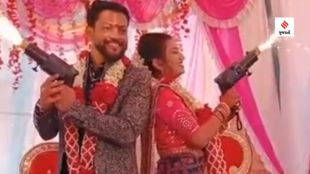 Couple sparkle gun stunt